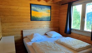 Luxus-Holzchalet - Elternschlafzimmer mit Doppelbett